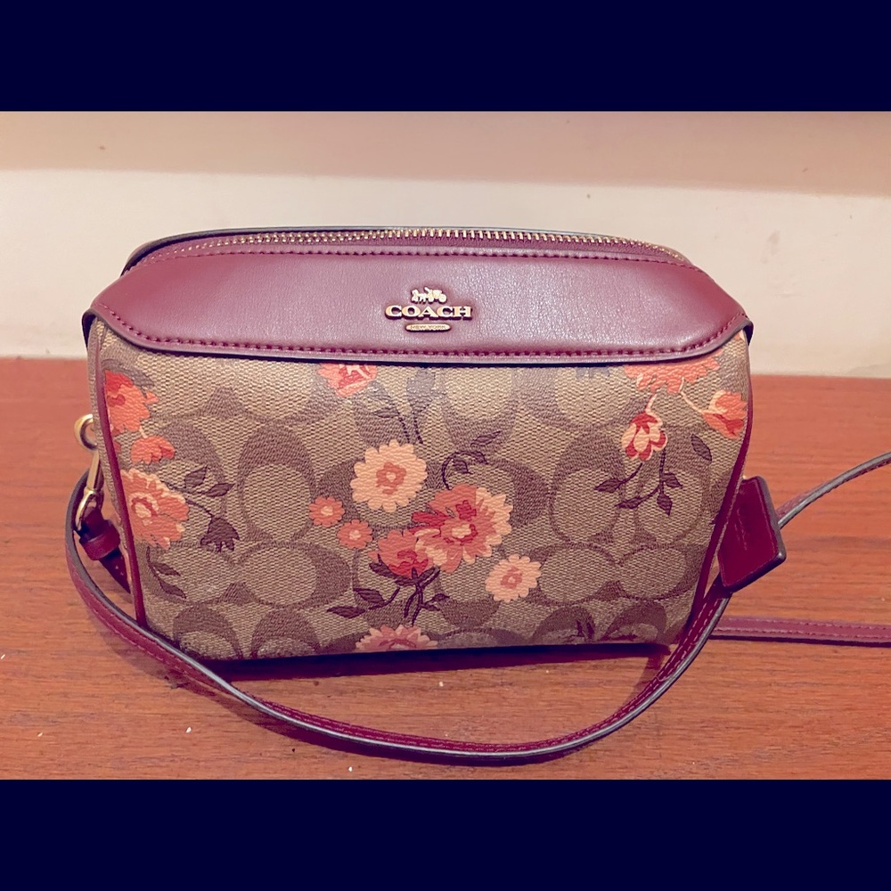 Coach floral leather pocketbook. Like new!